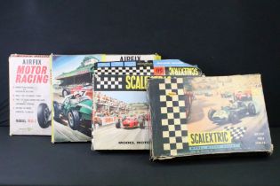 Four boxed slot car sets to include 2 x Scalextric Model Motor Racing (set GP33 & set 50 -
