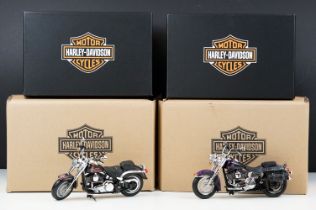 Two boxed Harley Davidson Diecast Promotions diecast models to include 81146 2011 H-D FLSTC Heritage