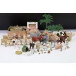 Collection of mid 20th C metal zoo animals to include Britains plus fencing and a box of Britains