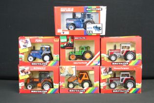 Seven boxed Britains 1:32 scale diecast model tractors to include 9508 Ford TW 25 Tractor, 9522