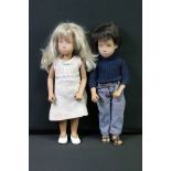 Two Trendon Sasha dolls, one dressed in a cream & silver dress with cream shoes, the other in