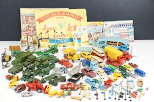 Around 60 mid 20th C play worn diecast models to include Dinky, Corgi and Matchbox examples,