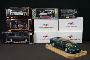 Nine boxed 1/10 - 1/24 diecast models to include Welly Dodge 02 Ram 1500 Quad Short Box, and 8 x