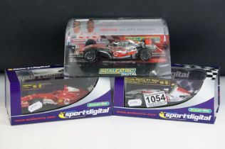 Three cased / boxed Scalextric Digital F1 slot cars to include C2676D Ferrari F2004 No1, C2715D