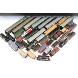 Over 50 OO gauge items of rolling stock to include wagons, coaches and vans featuring mainly kit