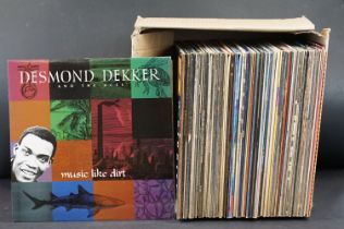 Vinyl - Over 80 LPs spanning genres and decades to include Desmond Dekker, Bo Diddley, Brian Eno &