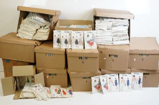 A very large collection of vintage sewing patterns contained within fourteen boxes.