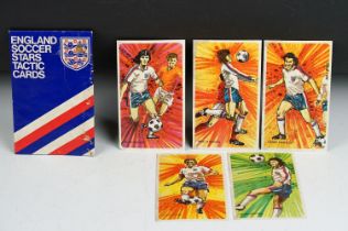 A quantity of England soccer stars tactic cards contained within card wallet.