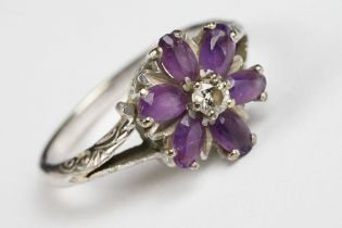 A ladies fully hallmarked 9ct white gold and amethyst dress ring. approx 5g in weight.