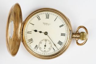 A fully hallmarked 9ct gold cased half hunter pocket watch, top winding movement.