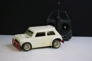 Acoms Techniplus radio control system remote control Mini Cooper car having a white body and red