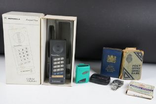 A small group of mixed collectables to include mobile phone, pagers, wristwatch and money bank.