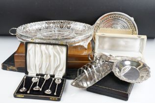 A collection of hallmarked silver and silver plated items to include cutlery sets, tea spoons, toast