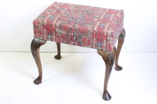 Early 20th century Dressing Stool, the upholstered seat raised on four carved cabriole legs and