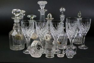 Eight cut glass decanters & stoppers (tallest approx 31cm) to include ships decanter examples,