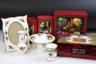 Group of Royal Albert Old Country Roses ceramics to include four photo frames and spill vases,