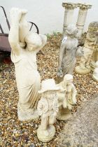 Four reconstituted stone garden sculptures to include two classical standing maidens, a seated