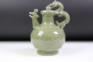 Chinese Yue kiln style green glazed ornament / ewer having a moulded dragon handle with cockerel