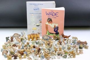 Large collection of assorted Wade whimsy animals together with the Wade price Guide and The World