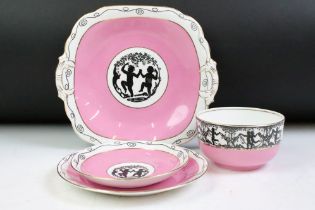 Group Ye Olde English Grosvenor China ceramics having a pink ground with a black and gilt