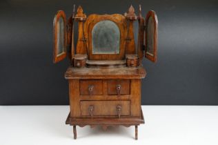 Early 20th century apprentice / salesman's miniature dressing table, with central swing mirror,