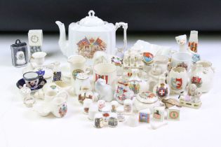 Collection of crested ware ceramics together with a selection of ceramic thimbles including Royal