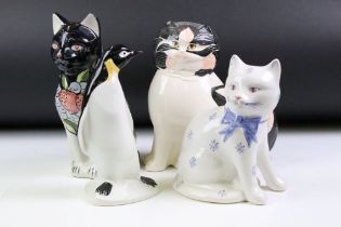 Group of four ceramic animals to include a Goebel cat, a Poole pottery penguin, Rye pottery cat