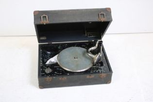 Early 20th Century Decca portable record player having a faux marble interior complete with a box of