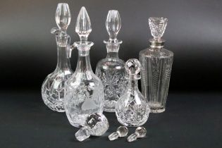 Four 20th century cut glass decanters & stoppers, to include an example of tapering form with