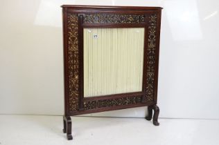 Early 20th century Mahogany Firescreen, with glazed pleated fabric centre surrounded by a fretwork