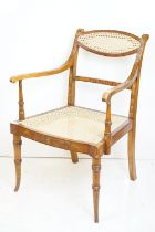 Sheraton Revival Elbow Chair with hand painted floral decoration to frame and cane back panel and