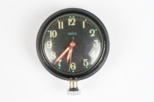 A mid 20th century Smith magnetic car dashboard clocks / watch