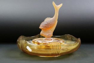 Art Deco 1930s pressed amber glass flower frog bowl having a removable fish centrepiece and reeded