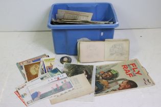 A collection of mixed ephemera to include scrap book, cuttings, stamps, posters, postcards....