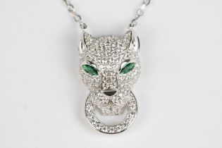 Silver and CZ designer style Leopard Head Pendant with emerald eyes