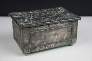 Arts and Crafts Pewter Covered Box with embossed floral decoration, the flowers set with green