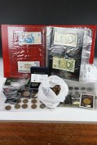 A collection of mainly British coins and banknotes to include commemorative and pre decimal silver