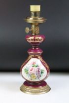 Early 20th century ceramic & gilt metal table lamp with hand painted floral panel (signed), on