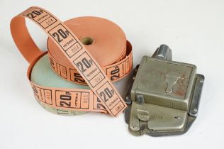 A Bell Punch & Printing Co. ticket machine together with two rolls of unused tickets.