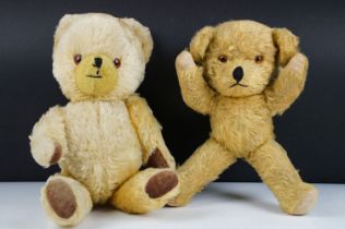 Mid 20th C straw-filled teddy bear (approx 32cm high), together with a jointed teddy bear with