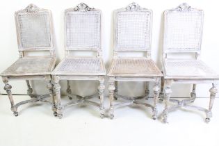 Set of Four Italian style Distressed Painted Dining Room Chairs with cane back panels and seats,