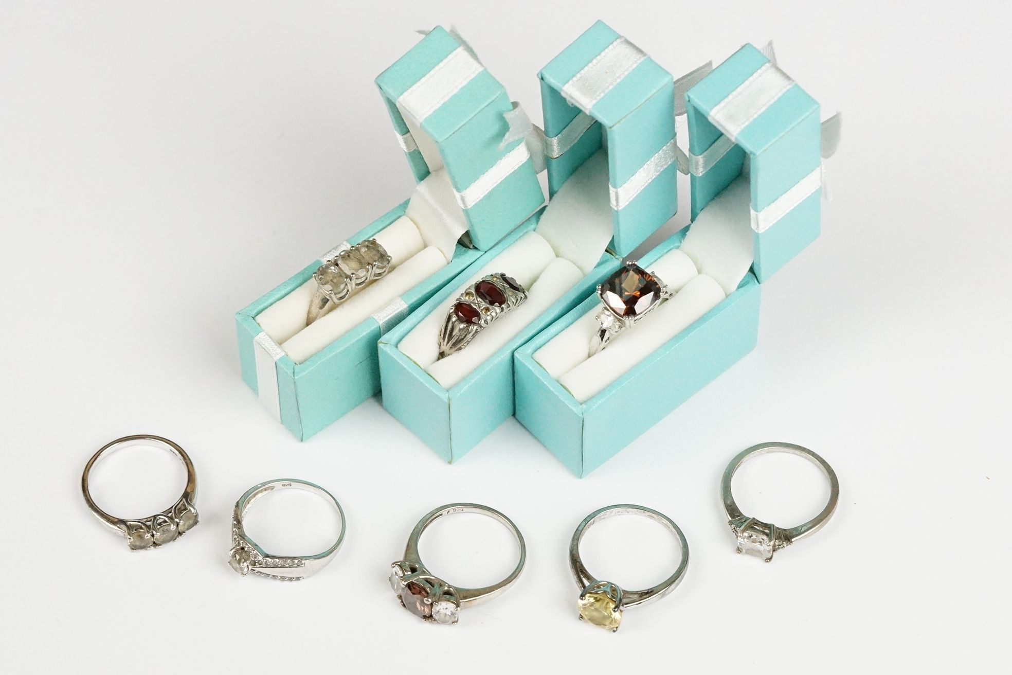 A collection of eight 925 sterling silver ladies dress rings.