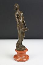 Bronze Female Figure on a stepped marble base, approx 20cm high