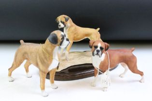 Three resin boxer figurines to include Border Fine Arts, Leonardo Collection and Heritage. Tallest