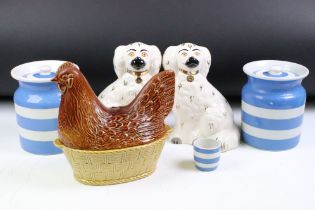 Two Cornish ware blue and white striped lidded jars with a matching egg cup, a pair of Staffordshire