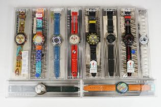 A collection of ten unworn Swatch Swiss made wristwatches to include 1996 Atlanta Olympics, 100