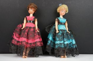 Two vintage Sindy dolls in similar dresses.