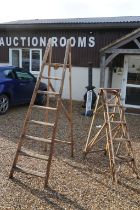 Two vintage wooden folding decorators step ladders, the largest approx 200cm high, the other with
