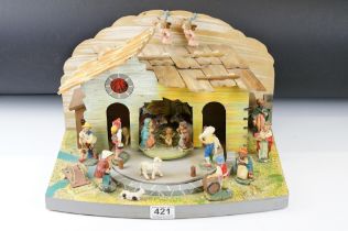 Mid 20th Century Italian painted wooden nativity diorama, with rotating platform surrounding the