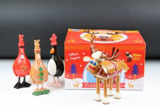 Four Aardman figurines to include a Grand Appeal Shaun in the city reindeer sheep figurine in